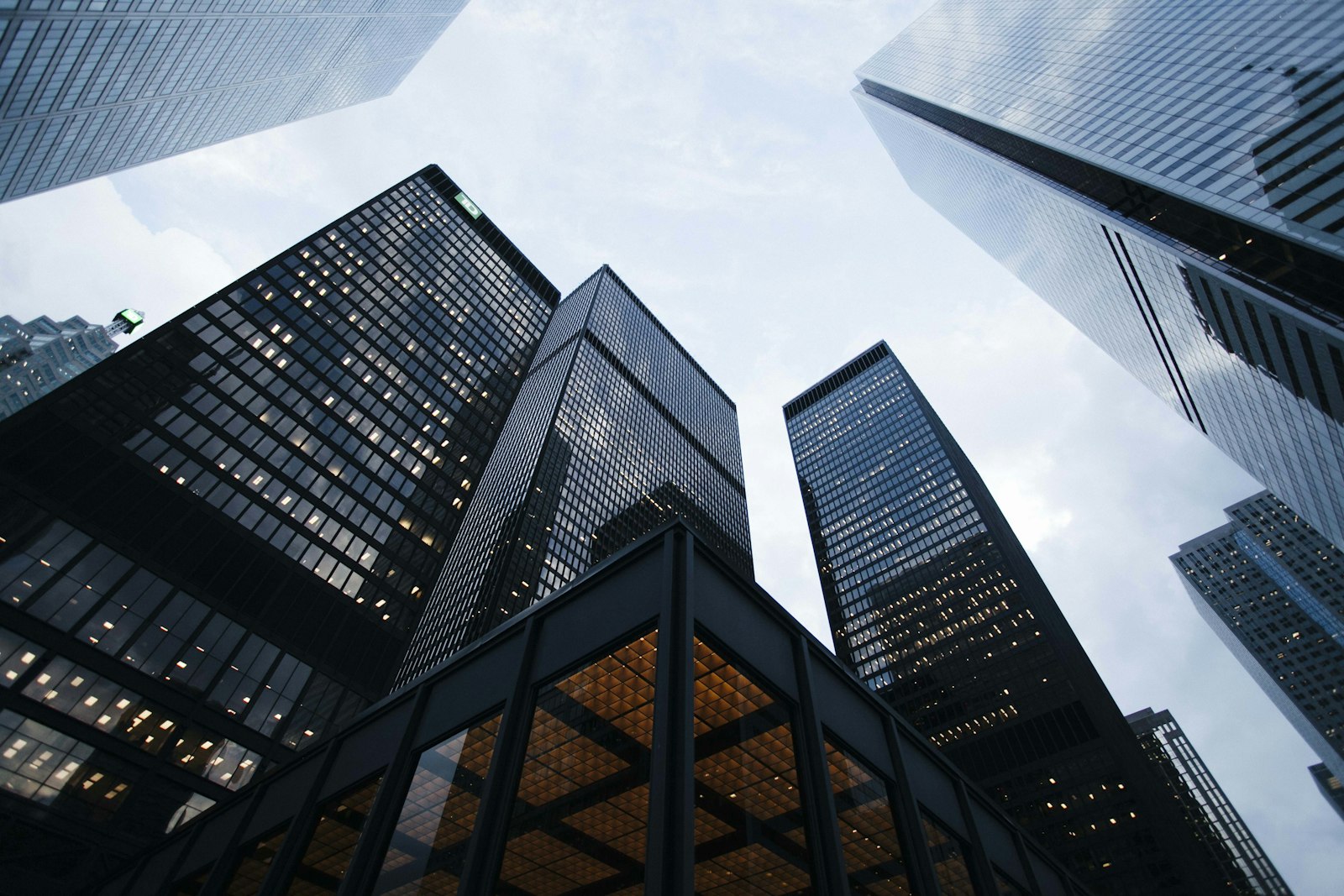 Black glass office buildings in low evening light