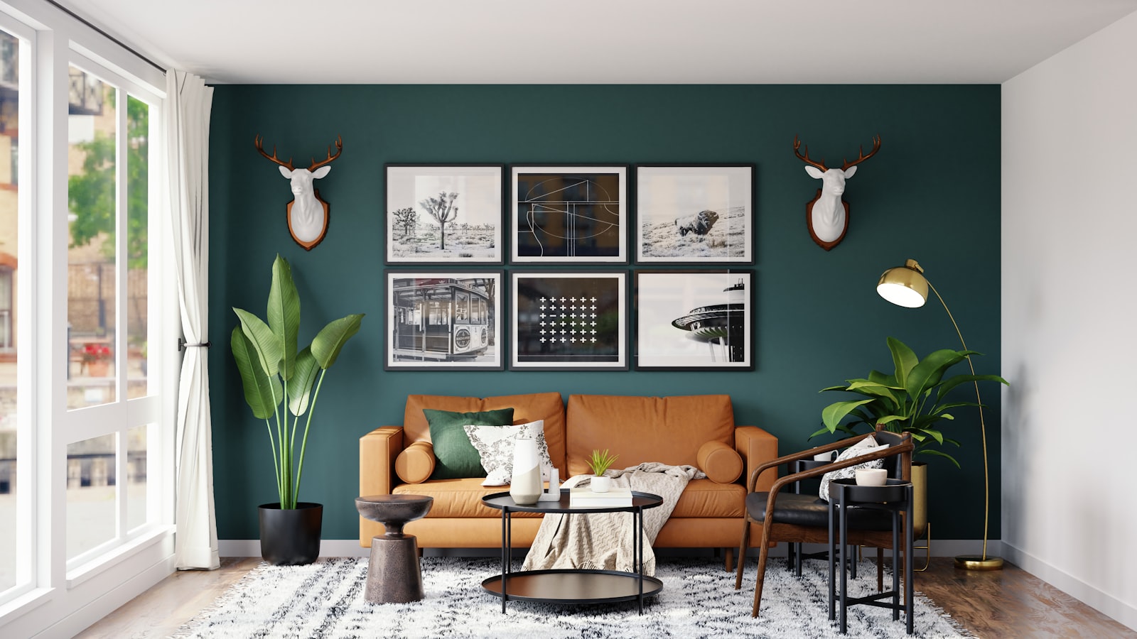 Restored hall lounge with deep green walls, a leather sofa, and framed artwork